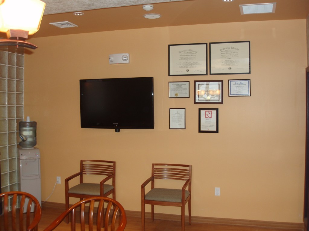 Seating area alternate view with awards on wall