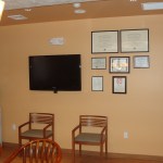 Seating area alternate view with awards on wall